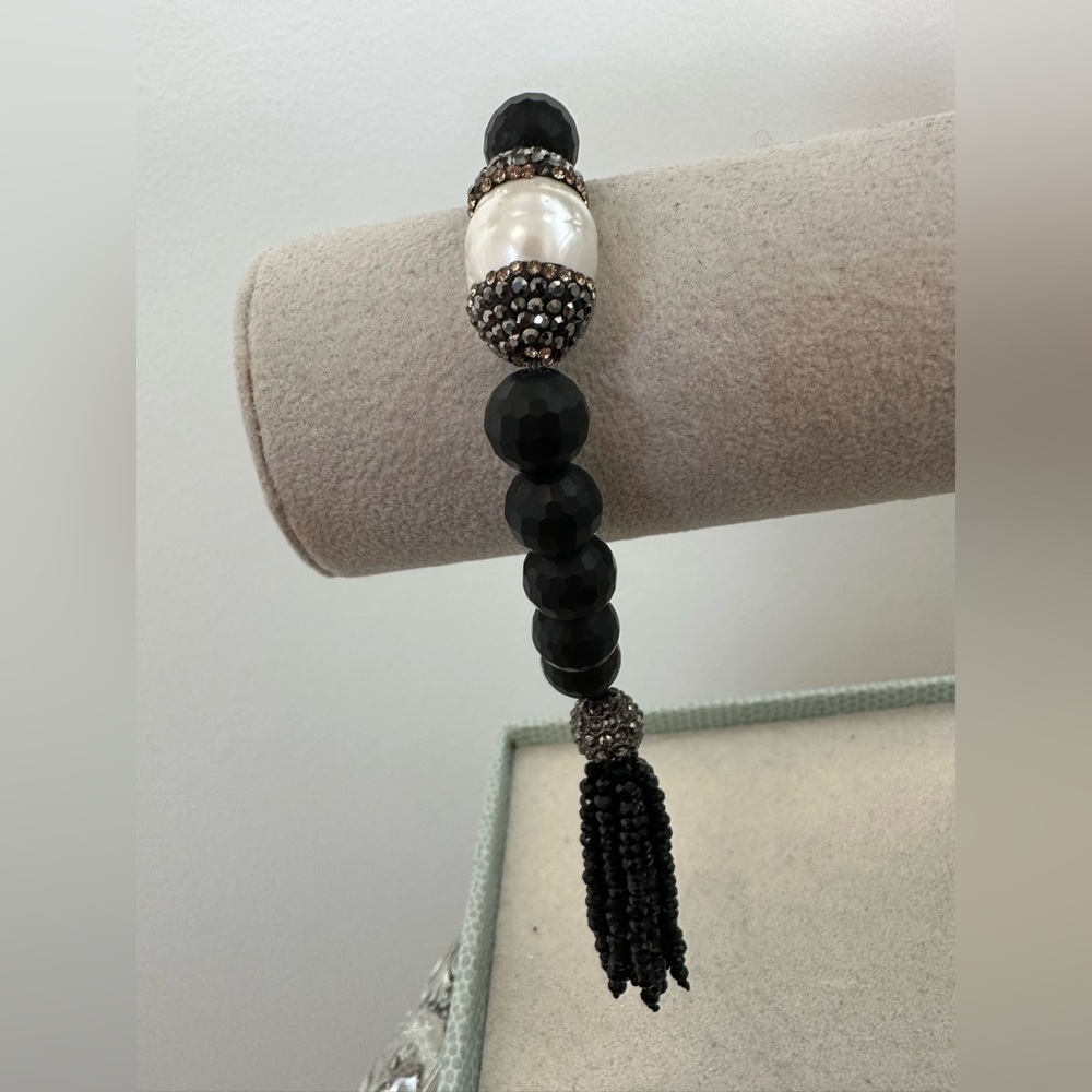 SALE-Beaded Bracelet Featuring Mother of Pearl Encrusted with Black Rhinestones.